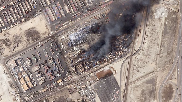 This satellite photo from Planet Labs PBC shows the epicenter of an explosion at the Shahid Rajaei port near Bandar Abbas, Iran, Monday, April 28, 2025. (Planet Labs PBC via AP)